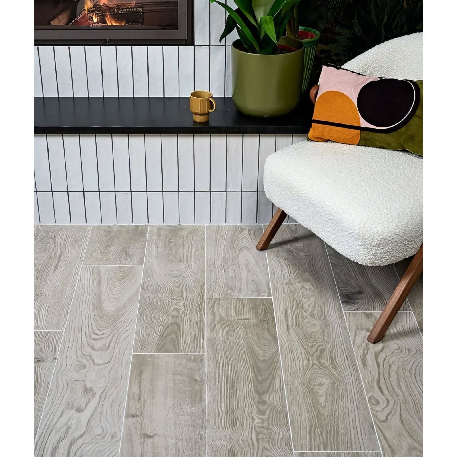 Parterre porcelain plank gray wood-grain vinyl flooring with subtle natural texture and light gray tones