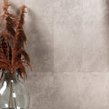 Riverside Wall Ceramic Perla white ceramic tiles with a glass vase of pampas grass