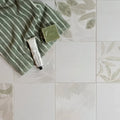 Signature porcelain mist green and white striped towel with soft textured weave for absorbent comfort