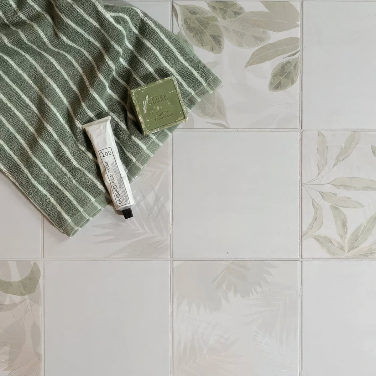 Signature porcelain mist green and white striped towel with soft textured weave for absorbent comfort