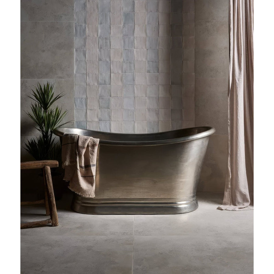 Polished chrome freestanding bathtub with sleek oval shape and elegant pedestal base southdown porcelain satin 60 x 120cm