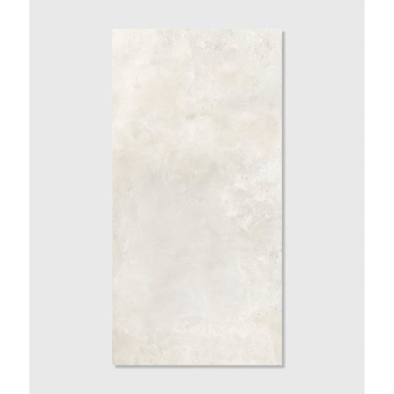 Cream-colored southdown porcelain satin tile 60 x 120cm with subtle mottled texture resembling natural stone