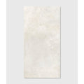 Cream-colored southdown porcelain satin tile 60 x 120cm with subtle mottled texture resembling natural stone