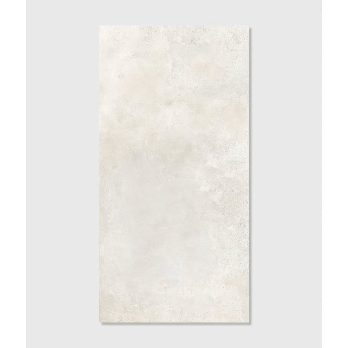Cream-colored southdown porcelain satin tile 60 x 120cm with subtle mottled texture resembling natural stone