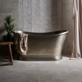 Southdown Porcelain Satin 60 x 60cm grey textured tiles with a freestanding bathtub