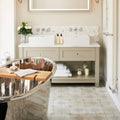 Shiny chrome freestanding bathtub with wooden bath board and towel in spitalfields ceramic retro star white finish