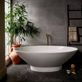 Treviso Porcelain Matt 59.5 x 59.5cm grey marble-effect tiles with a freestanding bathtub