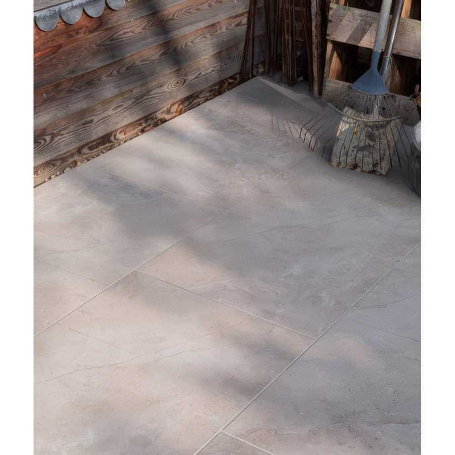 Winchester porcelain paving textured gray stone effect floor tiles with subtle veining and a matte finish
