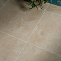 Beige marble-effect Winchester porcelain satin floor tiles 60 x 60cm with subtle veining and white grout lines