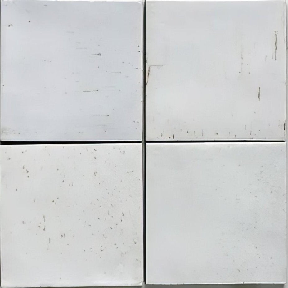 White square porcelain tiles with subtle gray speckles and minor surface scratches from pottery porcelain natural cotton square collection