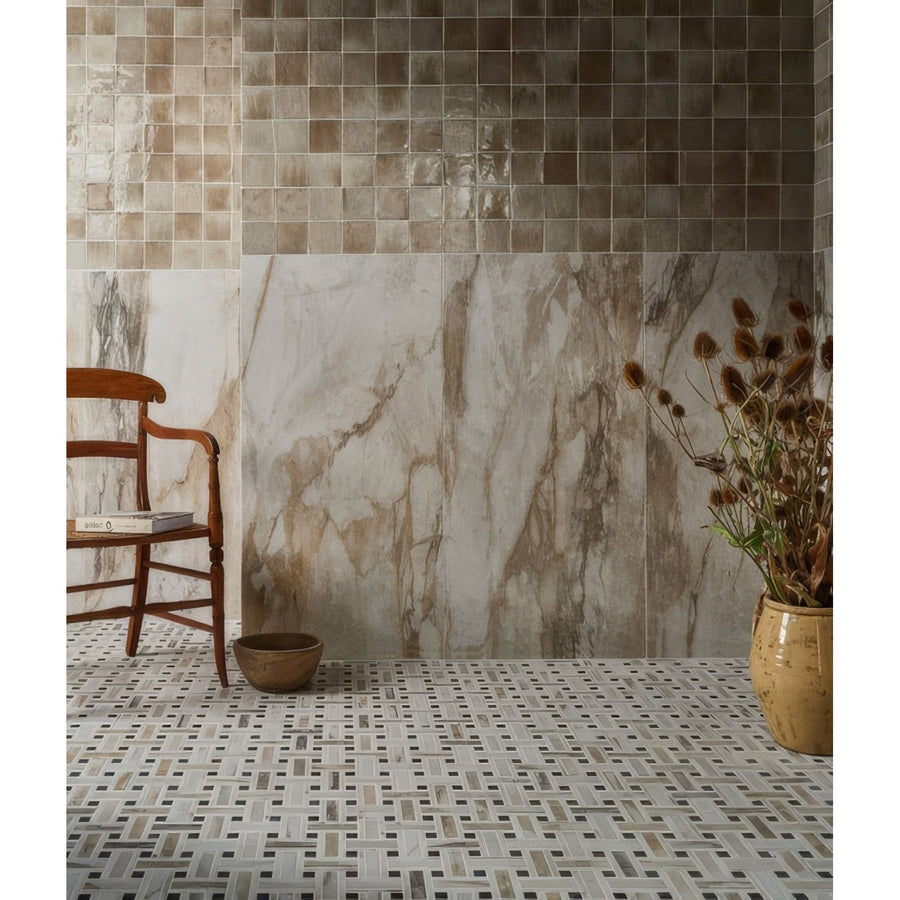Beige and gray mosaic tile wall with a marble-like pattern from pottery porcelain oatmeal square collection