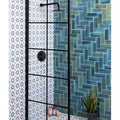 Black-framed shower enclosure with modern minimalist design featuring pottery porcelain ocean blue brick tiles