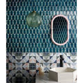 Preen Porcelain Mosaic Verdigris teal porcelain fish-scale mosaic with a white hexagonal sink and black tap