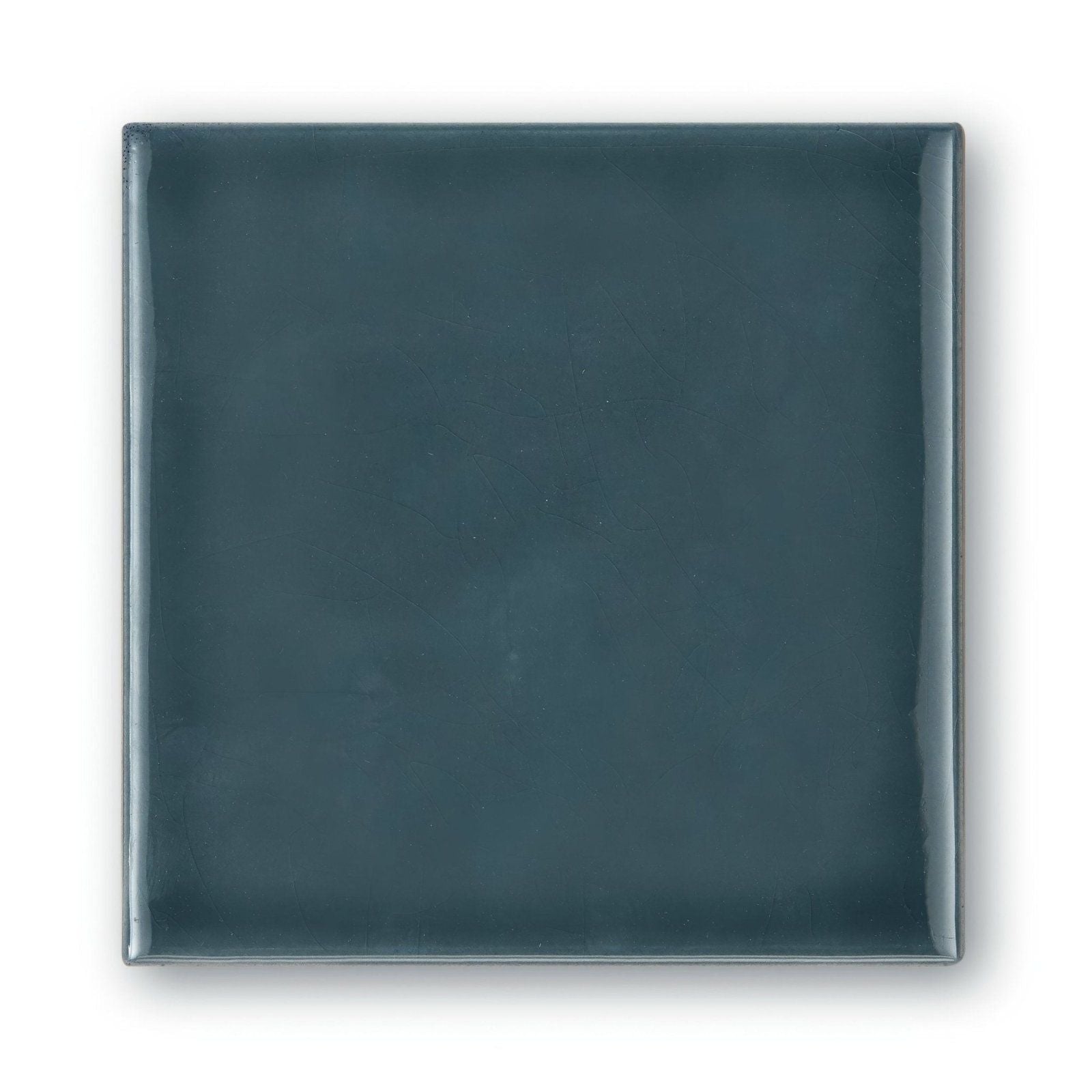 Provence Aspremont square ceramic tile with a smooth glossy dark teal finish for stylish surfaces