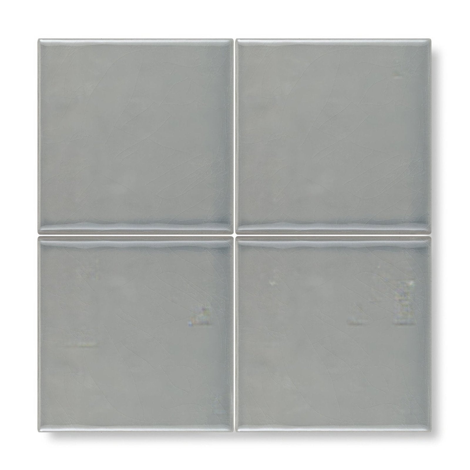 Set of four matte gray ceramic tiles arranged in a grid from the Provence Falicon Square collection