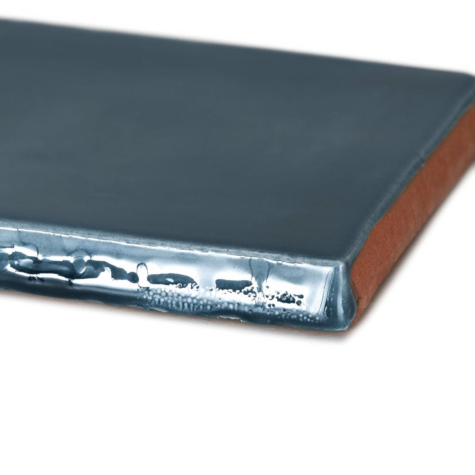 Dark gray ceramic rectangle tile provence peillon with a glossy finish and visible metallic edge
