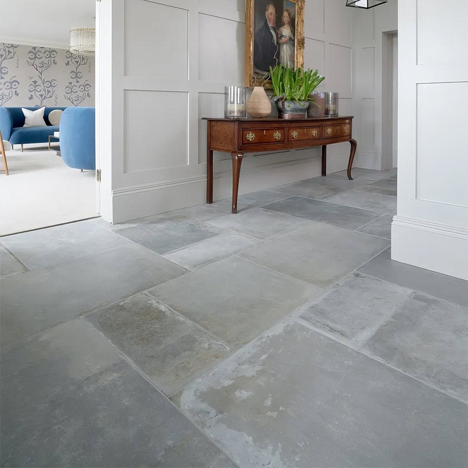 Gray porcelain floor tiles with natural uneven texture and subtle tone variations from Provence porcelain cenere collection