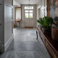 Provence porcelain cenere gray stone floor tiles with a subtle matte finish and natural veining