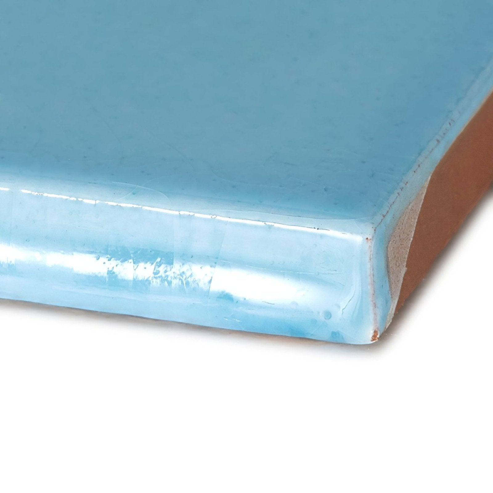Provence Turbie square ceramic tile with glossy light blue glaze and visible terracotta edges