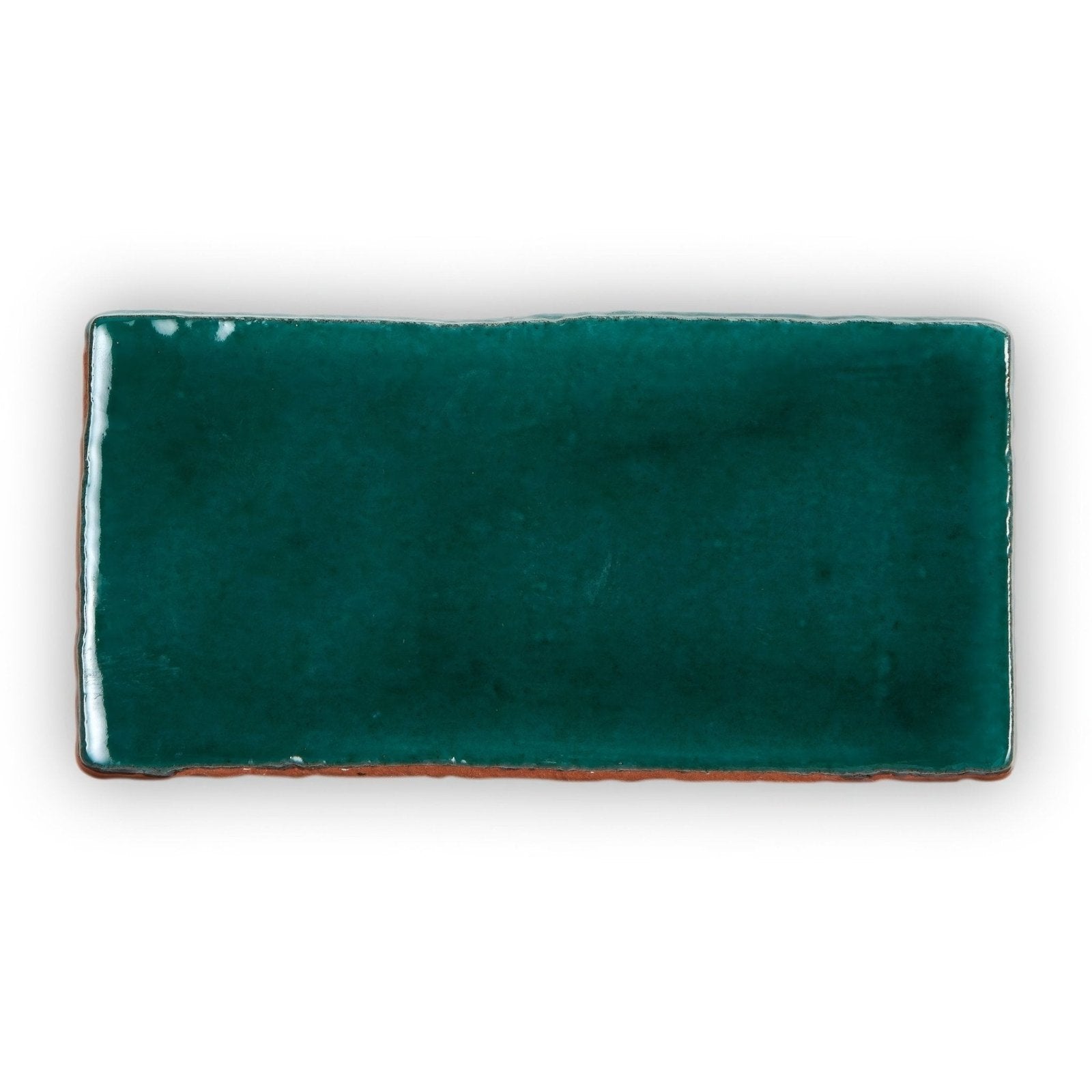A rectangular ceramic tile named Provence Valette rectangle with a glossy deep teal glaze and terracotta edges