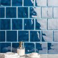 Prussian blue field tile made of blue glossy ceramic subway tiles with white grout for wall and backsplash use