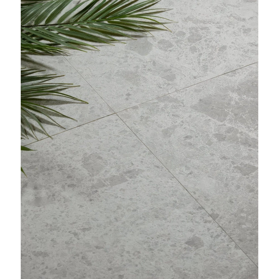 Light gray pumice porcelain off white floor tiles with marble effect subtle veining and polished finish
