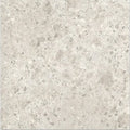 Pumice porcelain off white light gray terrazzo tile with speckled darker gray and white flecks pattern