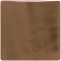 Putty field tile showing a smooth square brown glass tile with subtle tone variations and a faint textured surface