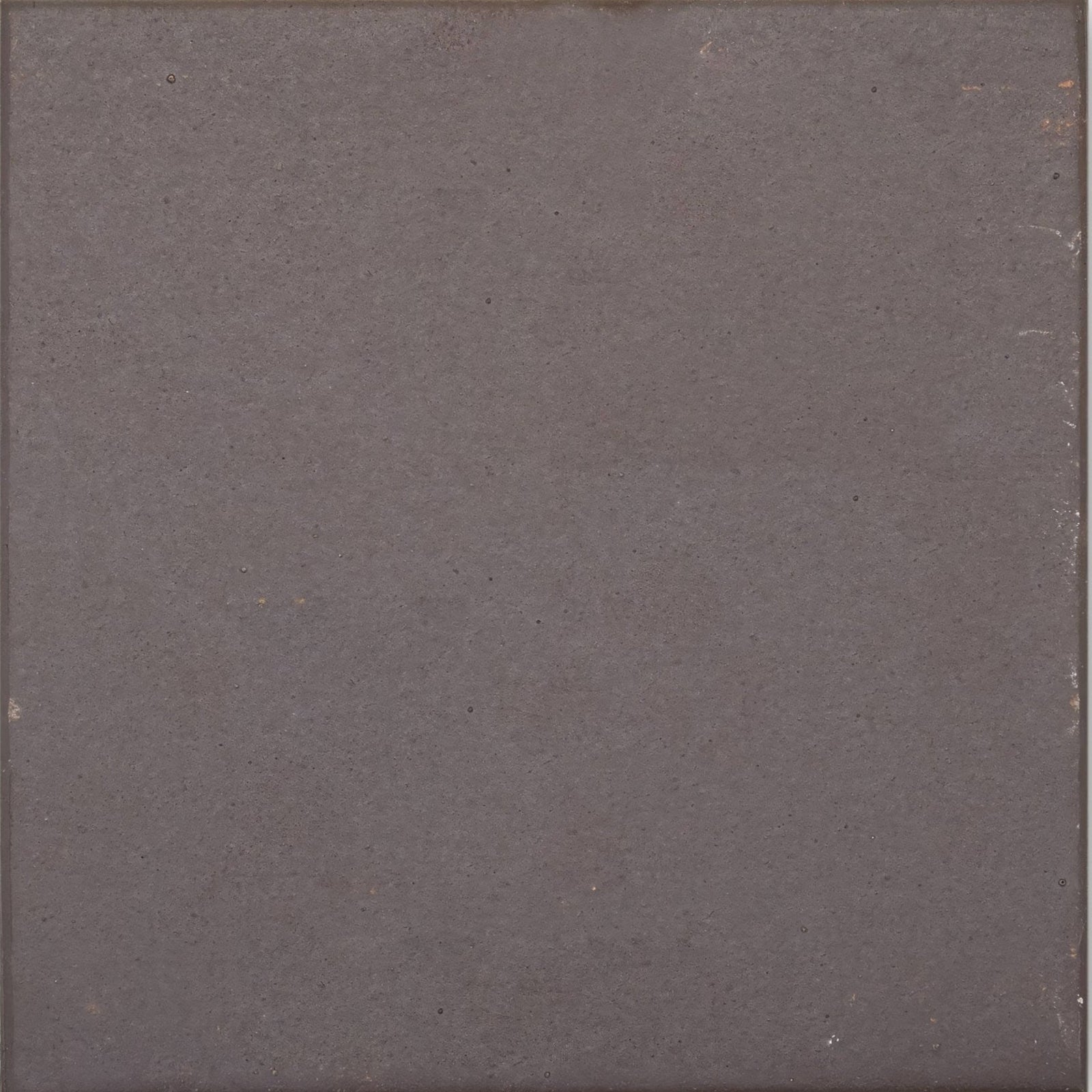 Dark gray quarry black square tile with matte slightly textured surface ideal for flooring and walls