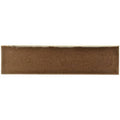 A rectangular brown ceramic quarry brick tile with a matte textured surface and slightly uneven edges