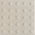 Beige quartz multidisc quarry tile with textured speckled surface and raised circular bumps 148x148x9mm