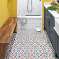 Patterned ceramic floor tiles with red beige and gray geometric design on white background quintessential porcelain salisbury