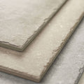 Beige stone-effect quintili tiles 60 x 90cm with textured surface and rustic edges for natural stone look flooring
