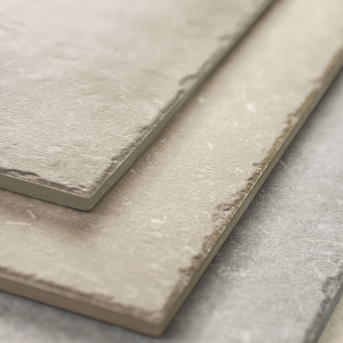 Beige stone-effect quintili tiles 60 x 90cm with textured surface and rustic edges for natural stone look flooring