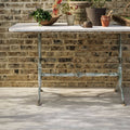 Weathered green metal garden table with white marble top quintili sand 60 x 90cm for outdoor use