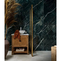 Rainforest Porcelain Malachite dark green marble-effect tiles with a white vessel sink