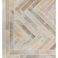 Beige and gray herringbone patterned ramsbury multi terracotta effect stone tiles with a rustic textured finish