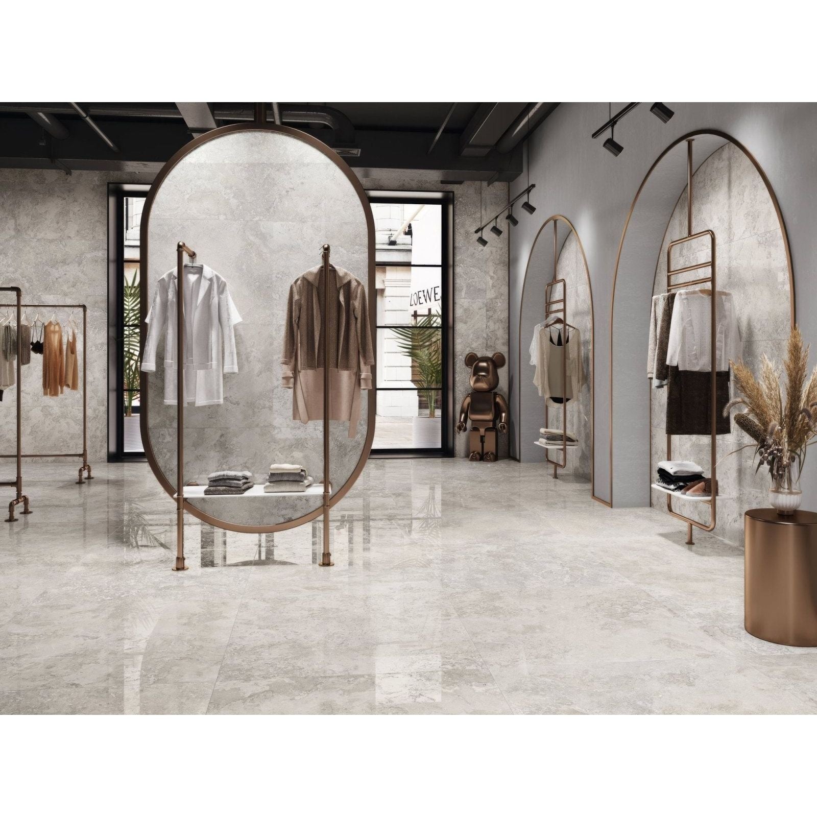 Rapolano 1868 Grey Polished grey stone-effect tiles in a minimalist retail interior