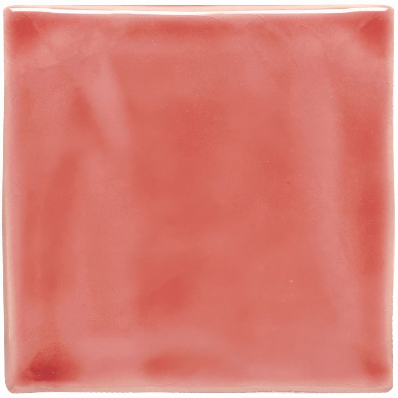 A square ceramic tile called raspberry field tile with a glossy muted coral finish and subtle color variations