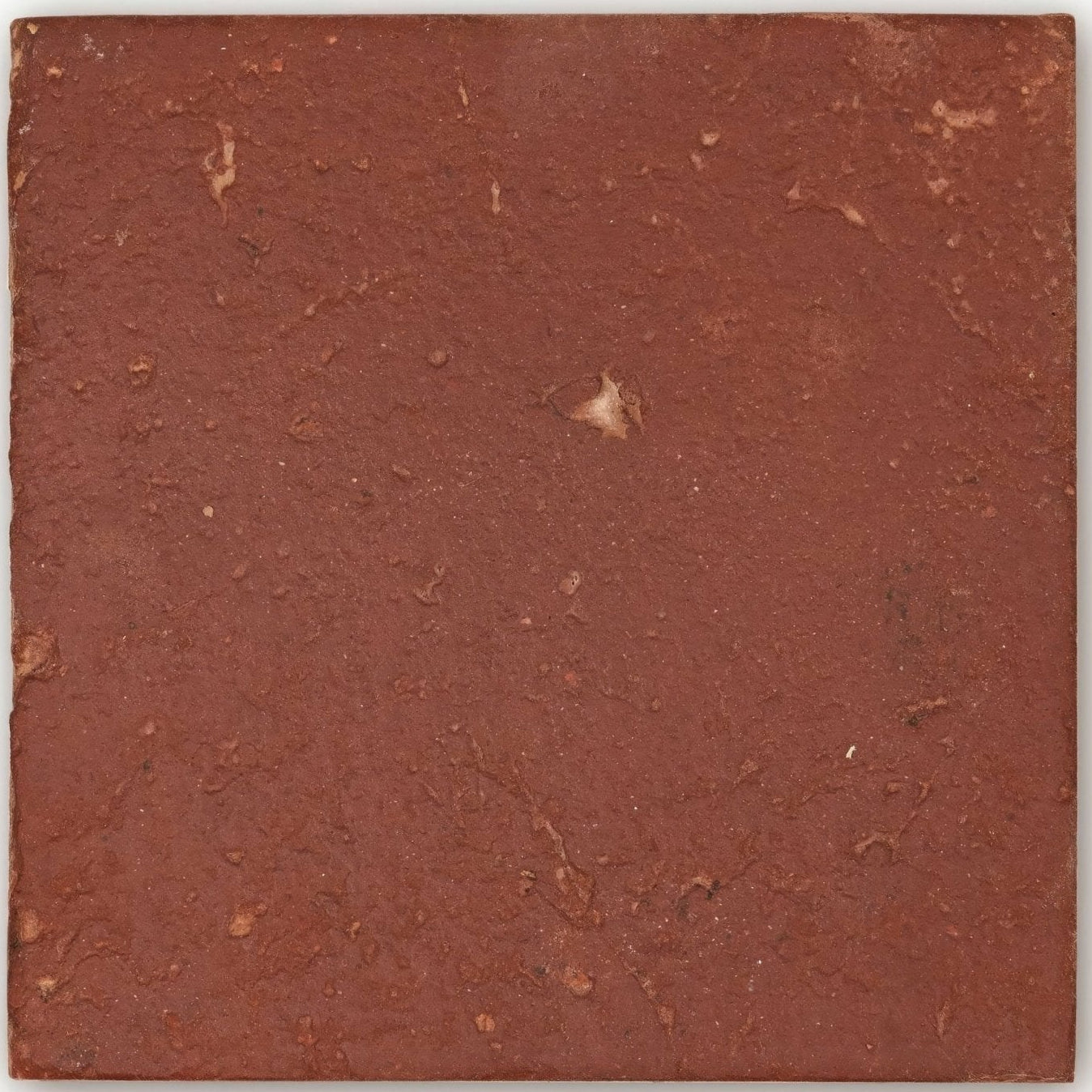Reclaimed terracotta square tile 15x15 in rustic red with textured surface and natural imperfections