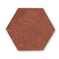 Red hexagonal reclaimed terracotta tile with textured earthy surface ideal for flooring and wall decoration