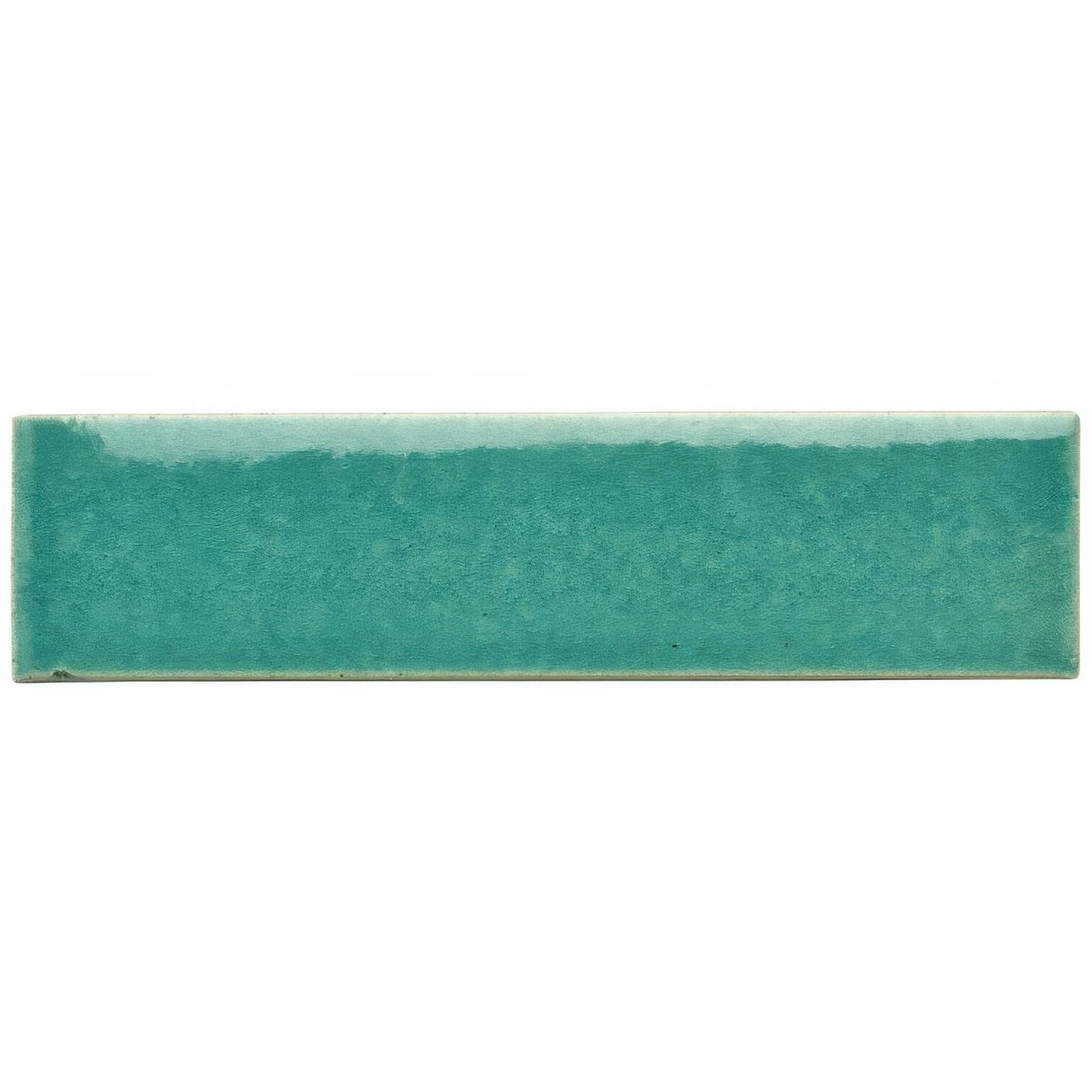A rectangular teal ceramic reef brick tile with a subtle textured surface and uneven glazed edges