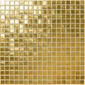 Gold foil mosaic tile with a shimmering reflective surface and white grout lines from reflection mosaic collection