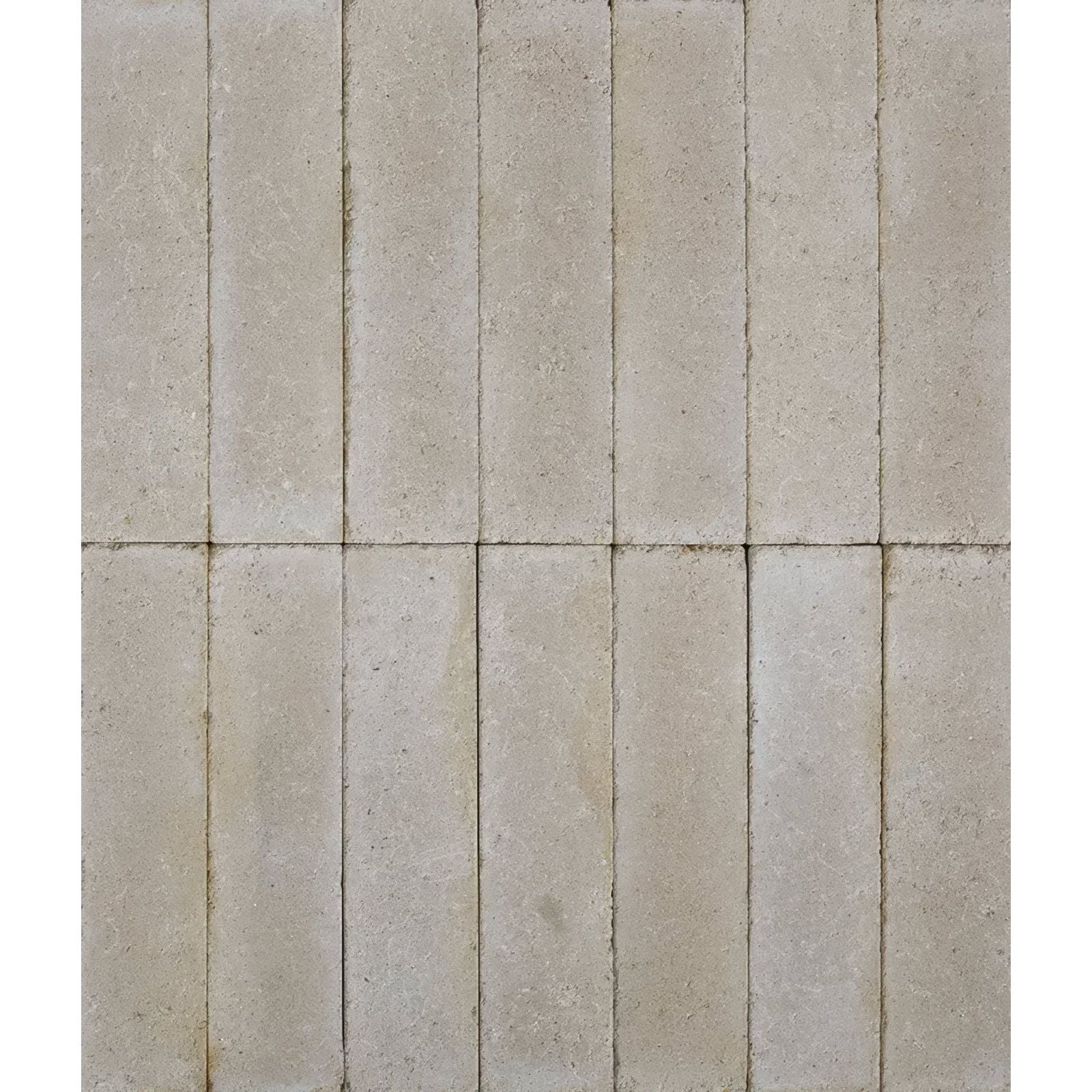 Beige rectangular reform composite stone tumbled bianco tiles arranged in a grid pattern showing textured surface
