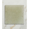 Square textured gray reform composite stone tumbled mint tile with a subtle speckled finish