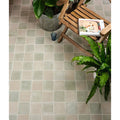 Beige and muted green reform composite stone tumbled mint square floor tiles with a subtle matte finish