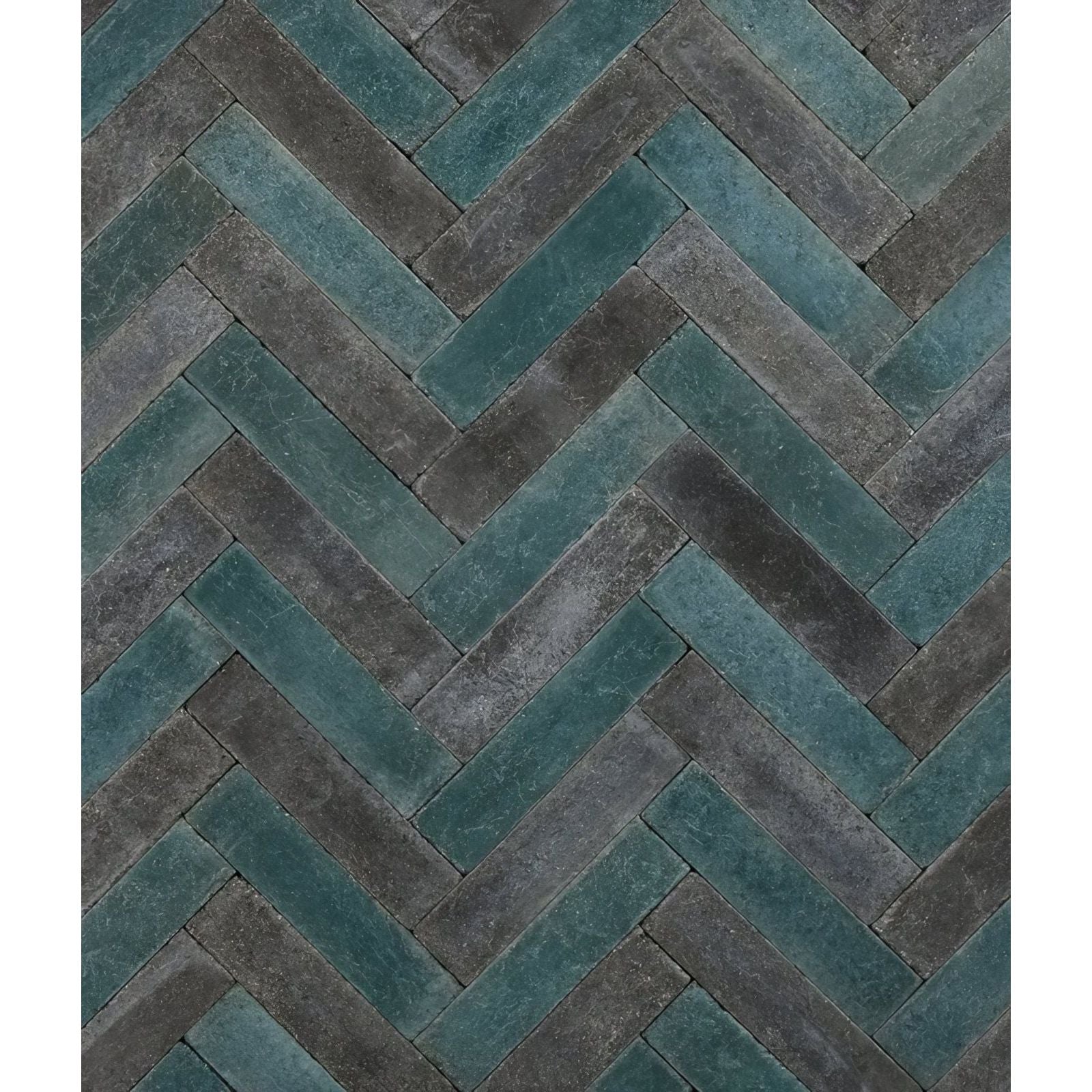 Reform composite stone tumbled nero featuring teal and dark gray herringbone patterned stone tiles
