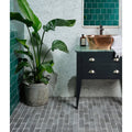 Copper bowl sink with a matte finish and rounded contours from reform composite stone tumbled nero collection
