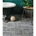 Reform Composite Stone Tumbled Nero shown as flooring (2)