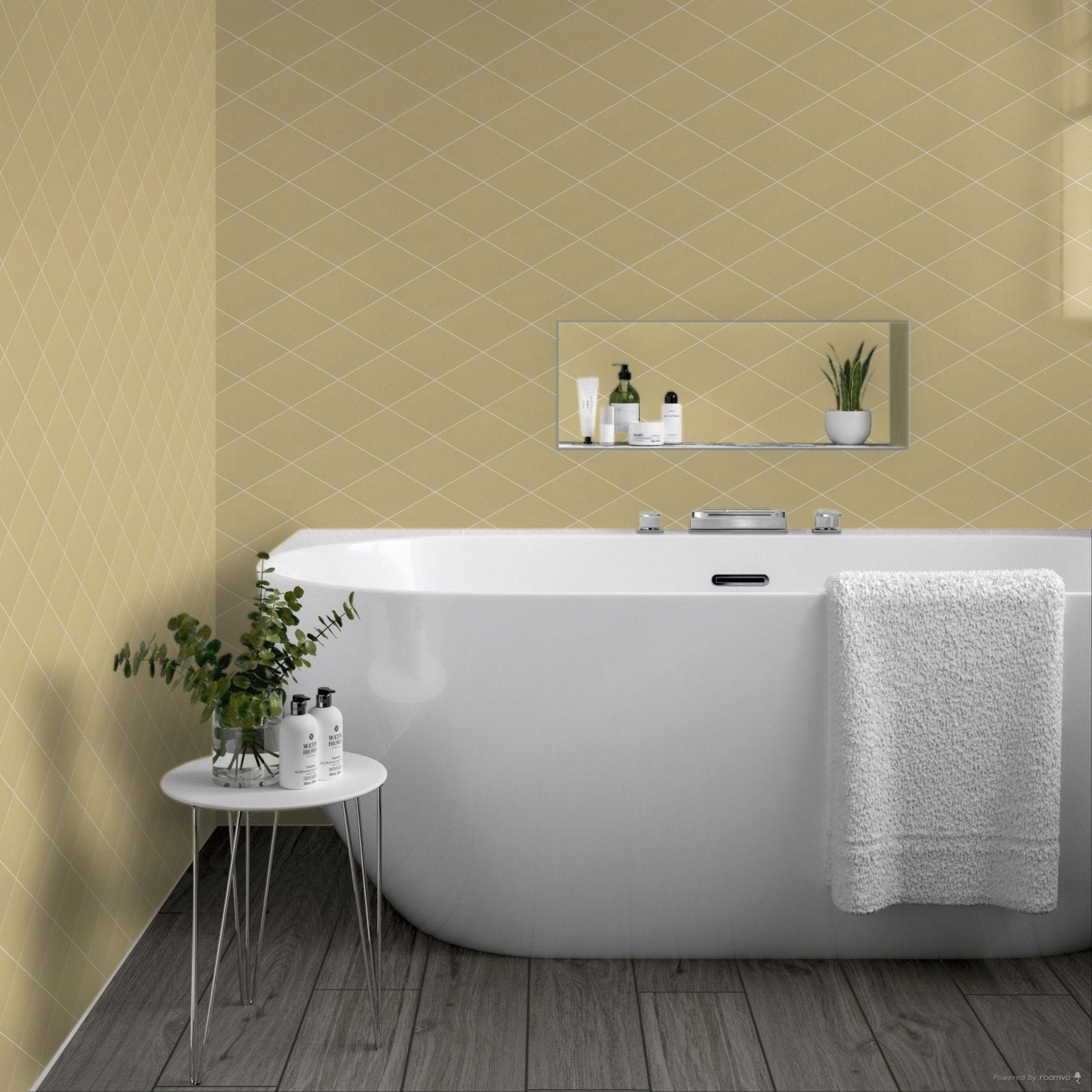 White freestanding bathtub with sleek modern design and smooth glossy finish next to rhomboid yellow ceramic wall tile